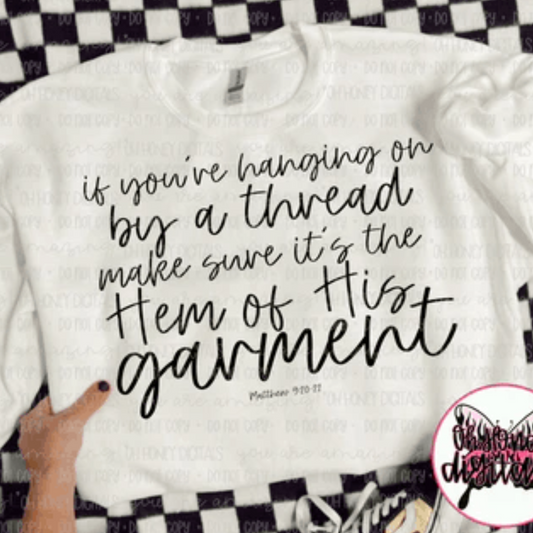 Hanging by his garment Tshirt